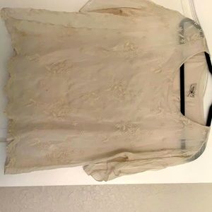 Cream colored blouse with enhance embroidery